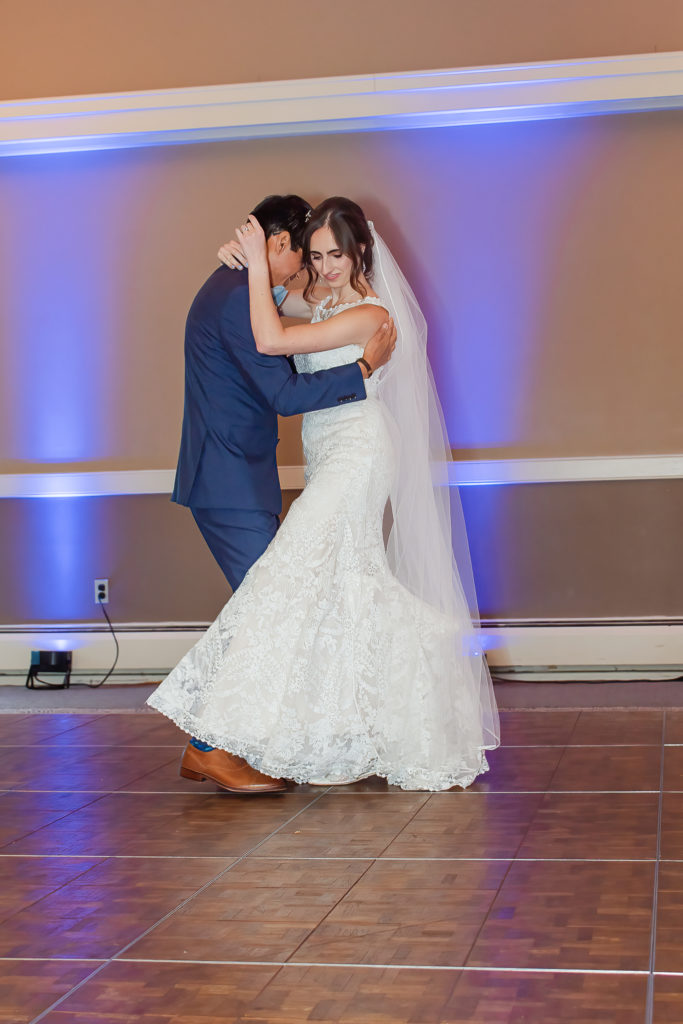 photo of bride and groom's first dance at wedding reception