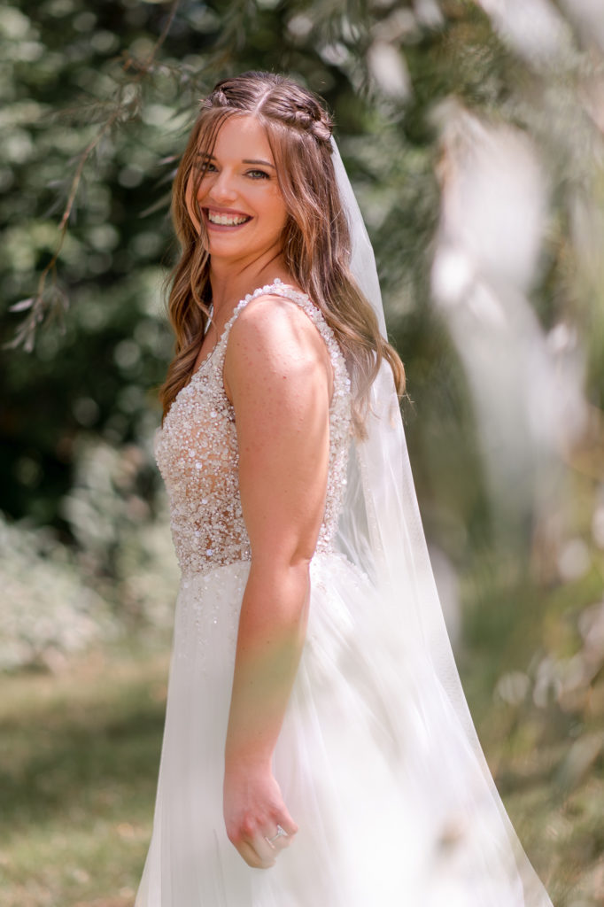 photo of bride laughing on wedding day