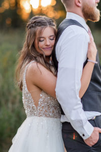 bride and groom posing on wedding day