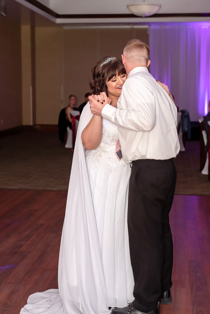 photo of bride and groom's first dance during wedding reception