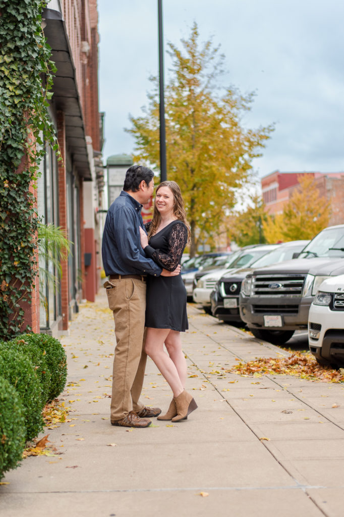 portrait of couple downtown during engagement session