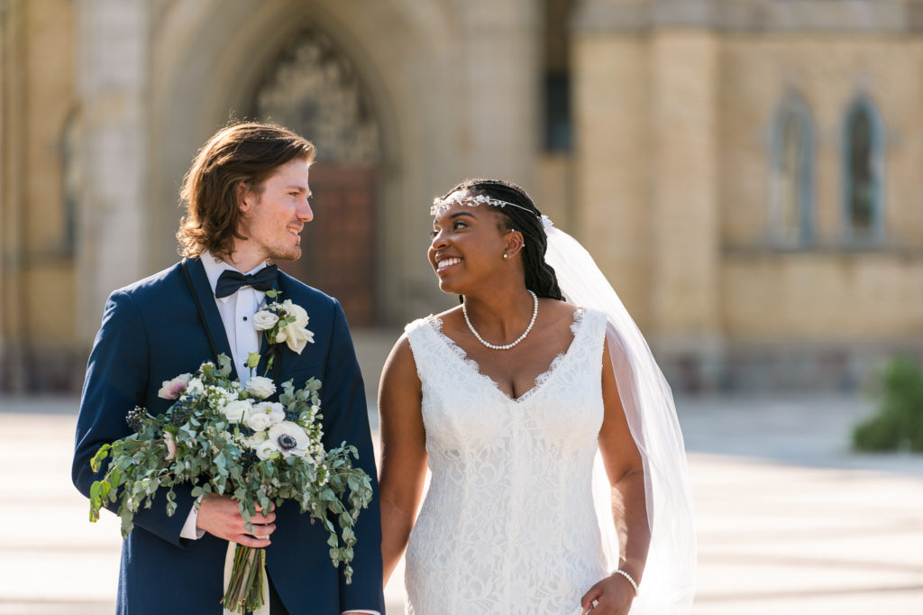 bride and groom looking at each other on wedding day