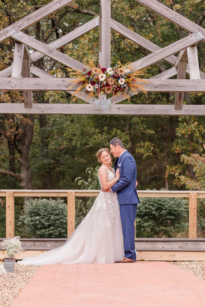 photo of bride and groom at outdoor ceremony space