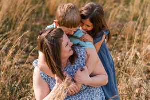 photo of mother with children during family photo session