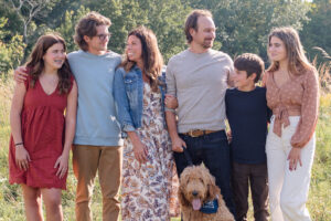 family looking at each other during family photo session