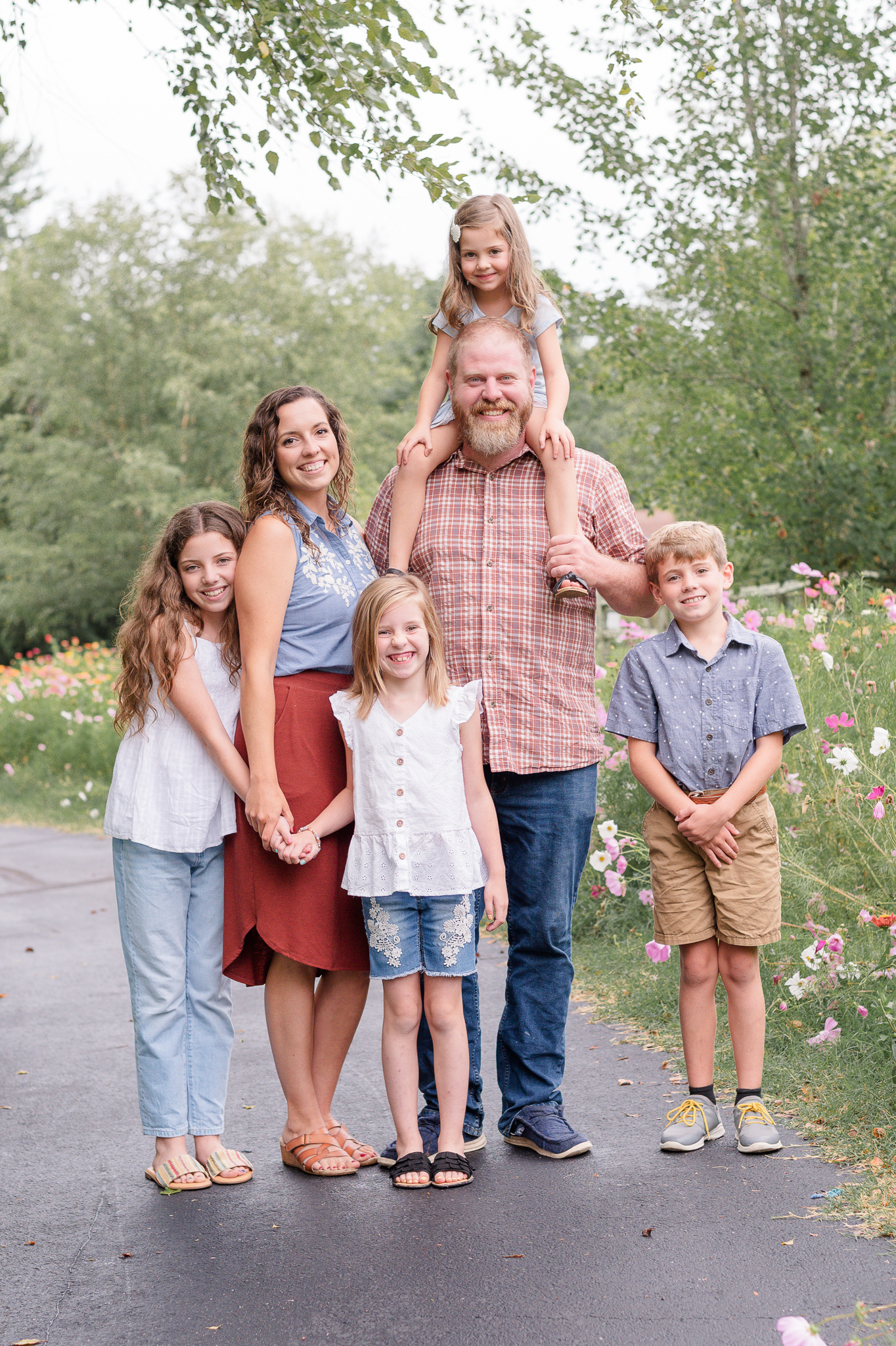 photo of family looking at each other during family photo session