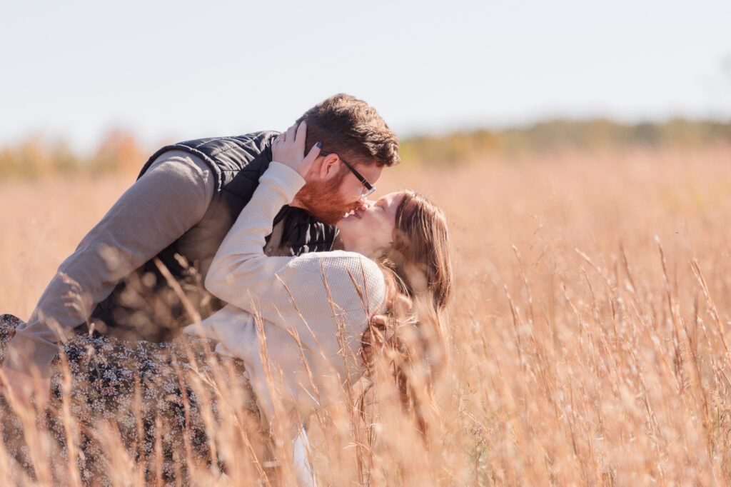 photo of a dip and kiss during an engagement session