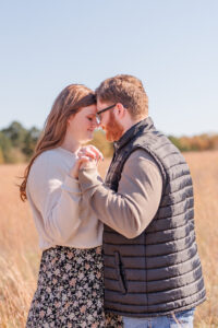 photo of couple looking at each other duing engagement session