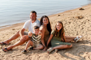 photo of family smiling during Lake of the Ozarks family session