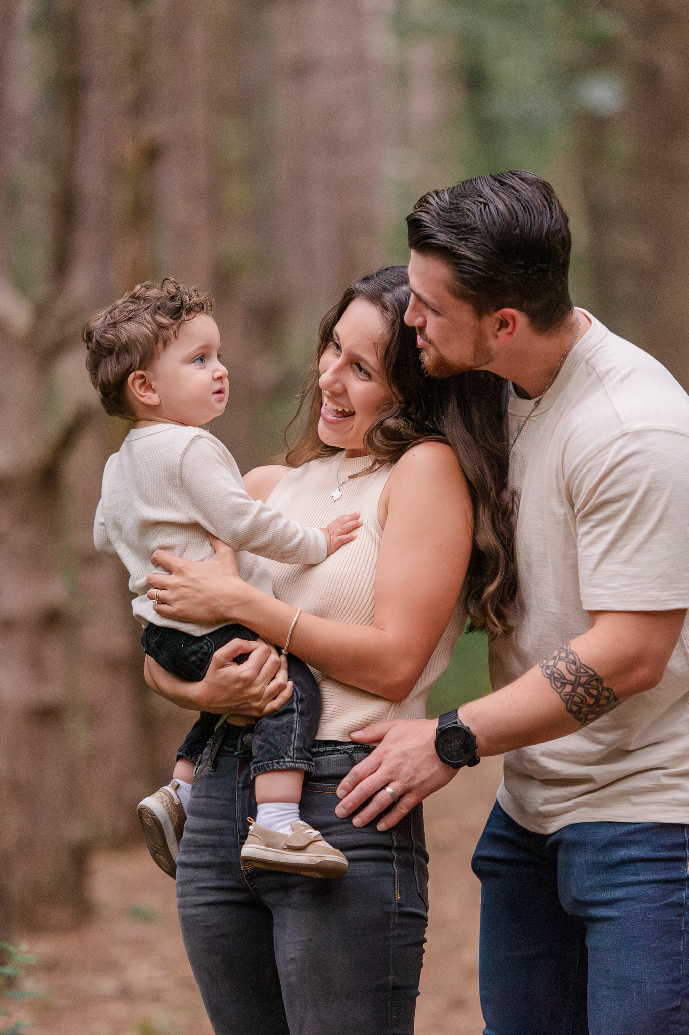 photo of family looking at each other during family session