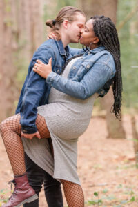 photo of couple kissing during maternity session