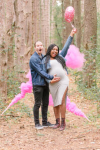 photo of couple celebrating during maternity session