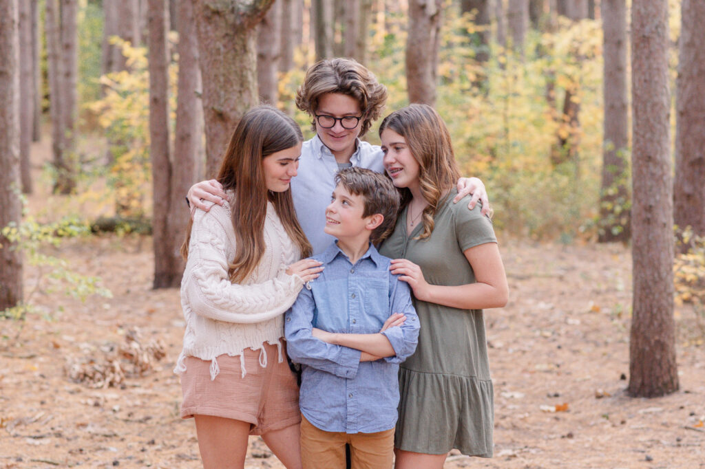 photo of kids looking at each other during family session